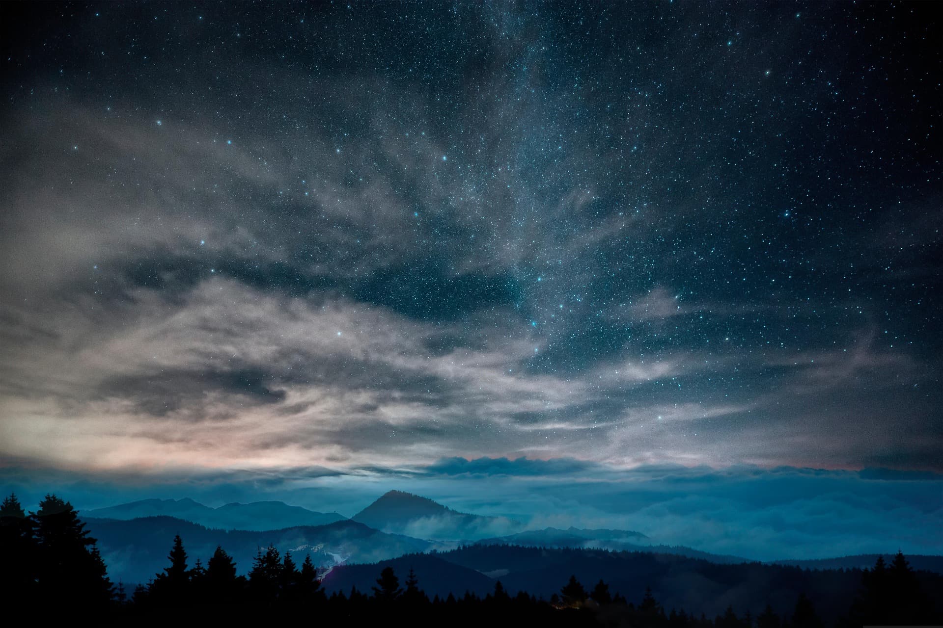 Wide open landscape under an expansive sky